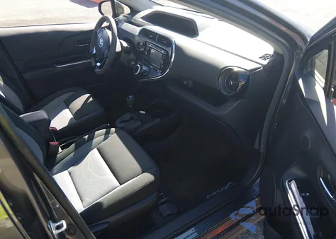 2018 Toyota Prius C Two z USA, uszkodzony, nr VIN JTDKDTB38J1607250